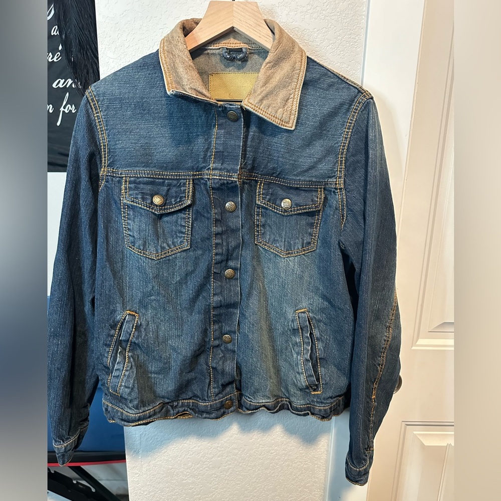 Denim jacket with leather collar